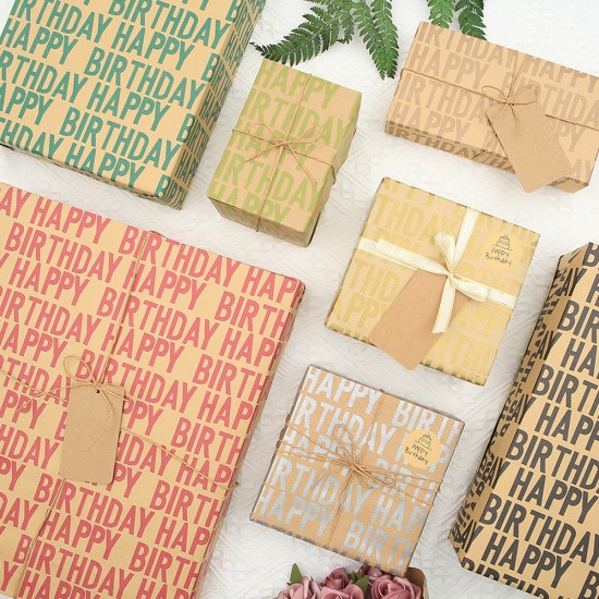 HAPPY BIRTHDAY WRAPPING PAPER feature classy "Happy Birthday" lettering design with plain brown kraft paper on the reverse available in 7 different trendy colors HAPPY BIRTHDAY WRAPPING PAPER feature classy "Happy Birthday" lettering design with plain brown kraft paper on the reverse available in 7 different trendy colors